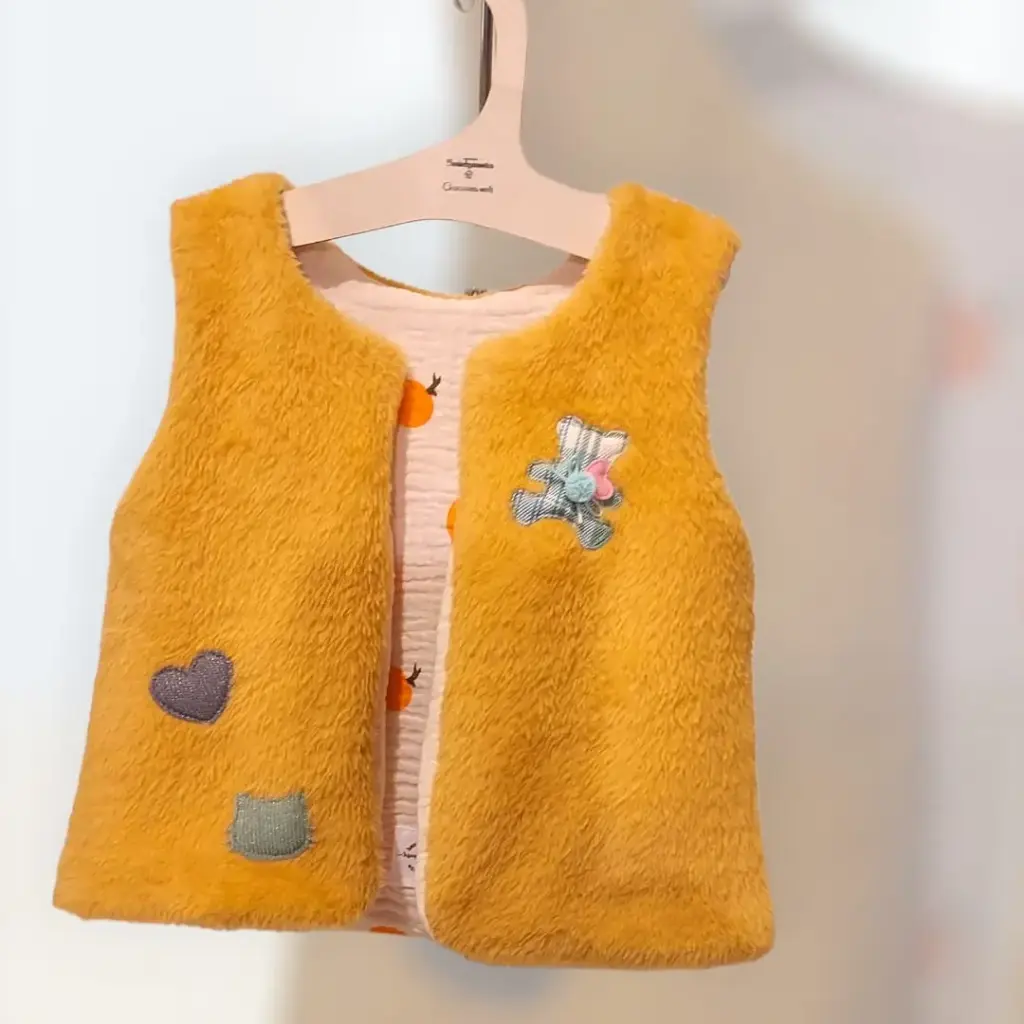 Gilet berger fausse fourrure moutarde 9/12 mois