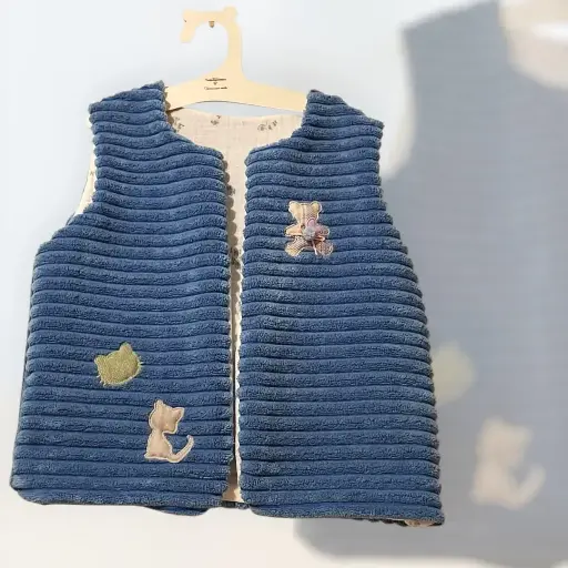 Gilet de berger velours bleu 12/18 mois