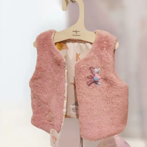 Gilet de berger fausse fourrure rose 3/6 mois